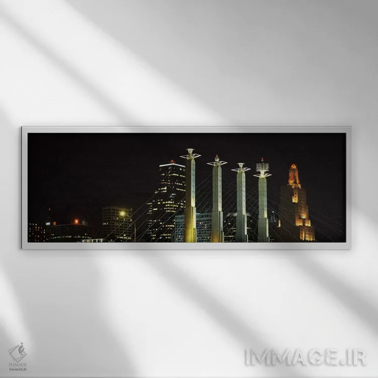 تابلو Kansas City, Jackson County, Missouri, USA,ساختمانهای روشن در شب در شهری، سالن بارتل، کانزاس سیتی، شهرستان جکسون، میزوری، آمریکا اثر پانورامیک ایمجز (استودیو عکاسی عریض) - نمای قابدار سفید