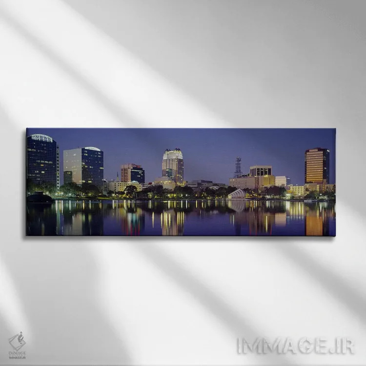 تابلو Orlando, Florida, USA #2,انعکاس ساختمانها در آب، اورلاندو، فلوریدا، ایالات متحده آمریکا (۲) اثر پانورامیک ایمجز (استودیو عکاسی عریض) - نمای روبهرو روی دیوار