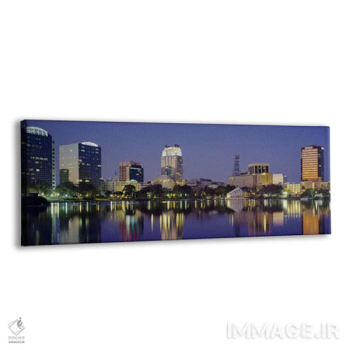 تابلو Orlando, Florida, USA #2,انعکاس ساختمانها در آب، اورلاندو، فلوریدا، ایالات متحده آمریکا (۲) اثر پانورامیک ایمجز (استودیو عکاسی عریض) - نمای پرسپکتیو محصول