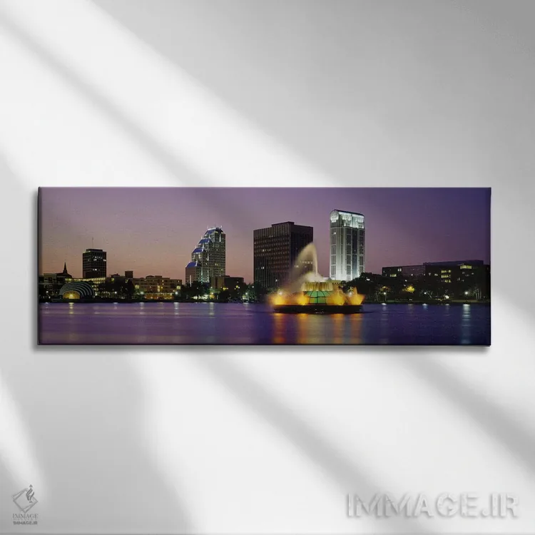 تابلو Lake Eola, Summerlin Park, Orlando, Orange County, Florida, USA,فواره دریاچهای روشن در شب، دریاچه ایولا، پارک سامرلین، اورلاندو، شهرستان اورنج، فلوریدا، ایالات متحده آمریکا اثر پانورامیک ایمجز (استودیو عکاسی عریض) - نمای روبهرو روی دیوار