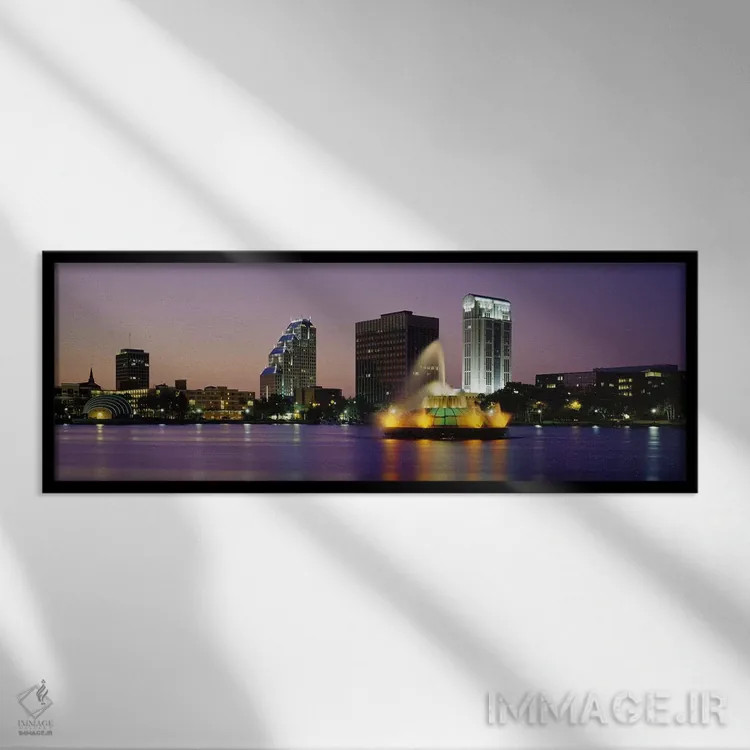 تابلو Lake Eola, Summerlin Park, Orlando, Orange County, Florida, USA,فواره دریاچهای روشن در شب، دریاچه ایولا، پارک سامرلین، اورلاندو، شهرستان اورنج، فلوریدا، ایالات متحده آمریکا اثر پانورامیک ایمجز (استودیو عکاسی عریض) - نمای قابدار مشکی