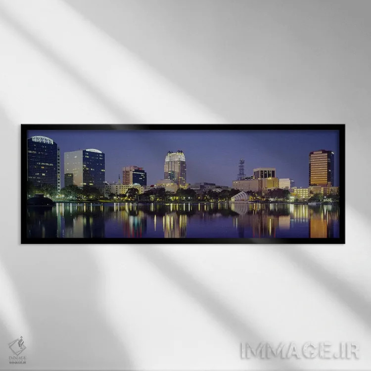 تابلو Orlando, Florida, USA #2,انعکاس ساختمانها در آب، اورلاندو، فلوریدا، ایالات متحده آمریکا (۲) اثر پانورامیک ایمجز (استودیو عکاسی عریض) - نمای قابدار مشکی