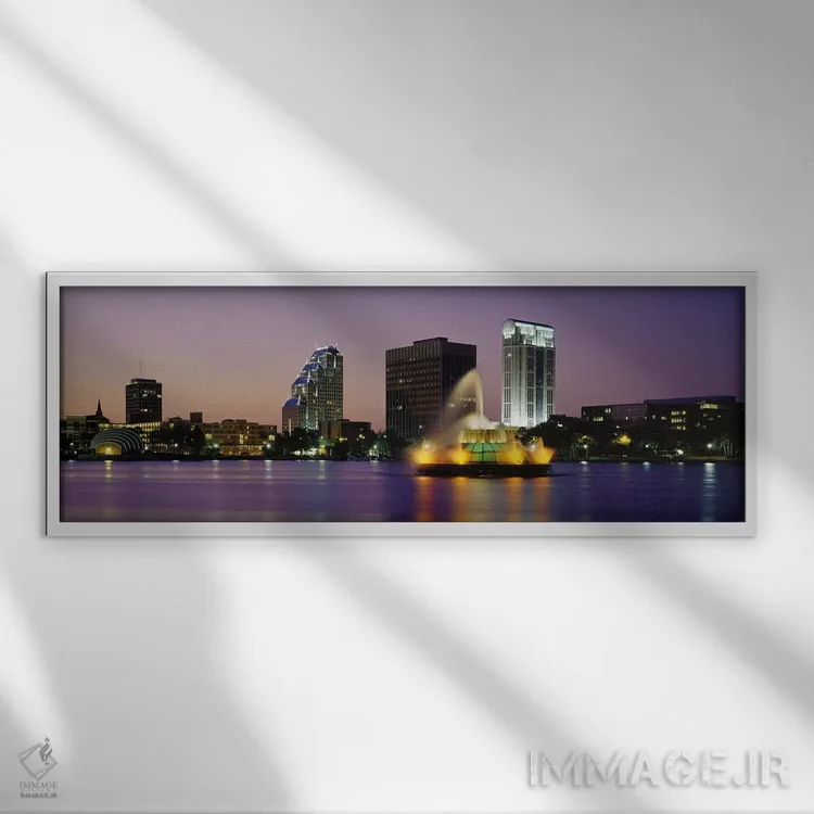 تابلو Lake Eola, Summerlin Park, Orlando, Orange County, Florida, USA,فواره دریاچهای روشن در شب، دریاچه ایولا، پارک سامرلین، اورلاندو، شهرستان اورنج، فلوریدا، ایالات متحده آمریکا اثر پانورامیک ایمجز (استودیو عکاسی عریض) - نمای قابدار سفید