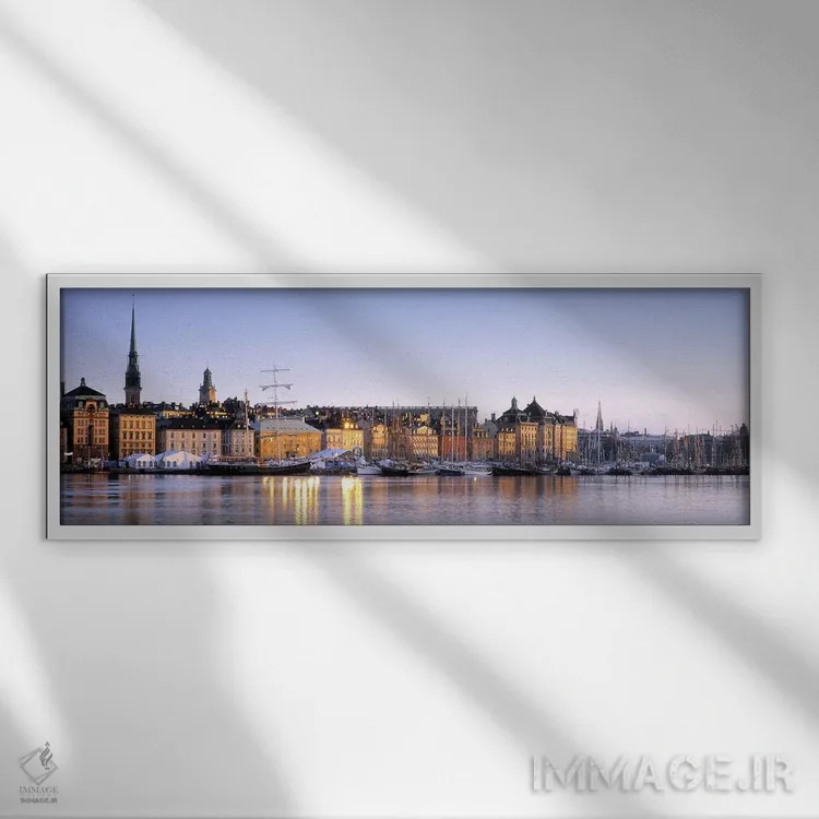 تابلو Skeppsbron, Old Town (Gamla stan), Stockholm, Sweden,کنار آب، اسکپسبرون، شهر قدیمی (گاملا استان)، استکهلم، سوئد اثر پانورامیک ایمجز (استودیو عکاسی عریض) - نمای قابدار سفید