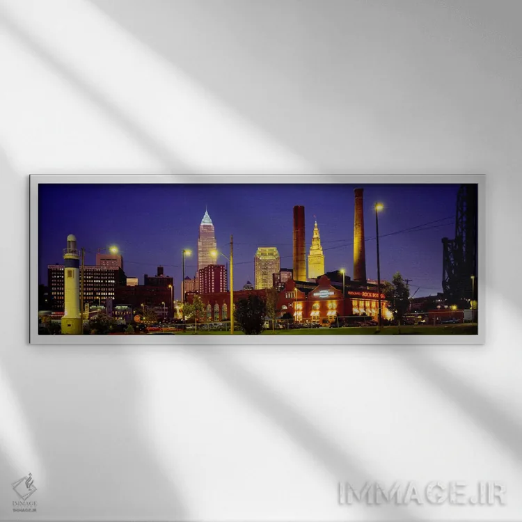 تابلو Cleveland, Ohio, USA,ساختمانهای روشنشده در شب، کلیولند، اوهایو، آمریکا اثر پانورامیک ایمجز (استودیو عکاسی عریض) - نمای قابدار سفید
