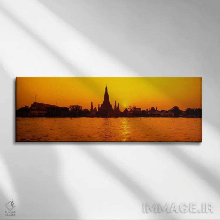 تابلو Bangkok, Thailand,درخشش نارنجی غروب بر فراز وات آرون و رود چائو فرایا، بانکوک، تایلند اثر پانورامیک ایمجز (استودیو عکاسی عریض) - نمای روبهرو روی دیوار