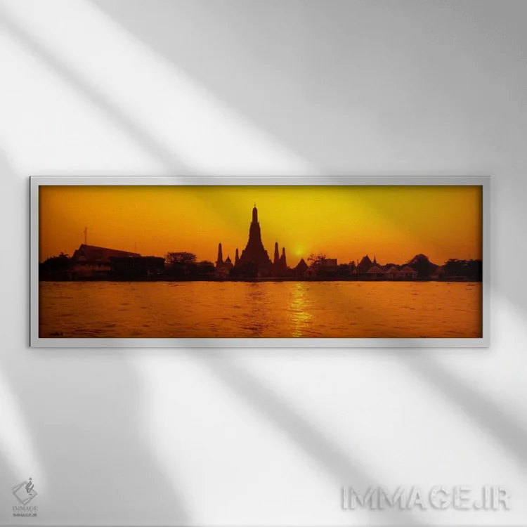 تابلو Bangkok, Thailand,درخشش نارنجی غروب بر فراز وات آرون و رود چائو فرایا، بانکوک، تایلند اثر پانورامیک ایمجز (استودیو عکاسی عریض) - نمای قابدار سفید