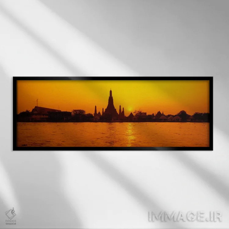 تابلو Bangkok, Thailand,درخشش نارنجی غروب بر فراز وات آرون و رود چائو فرایا، بانکوک، تایلند اثر پانورامیک ایمجز (استودیو عکاسی عریض) - نمای قابدار مشکی