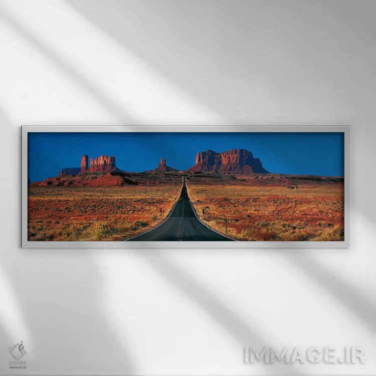 تابلو Monument Valley, Navajo Nation, Arizona, USA,منظره از بزرگراه ۱۶۳ آمریکا، دره یادمان، ملت ناواهو، آریزونا، ایالات متحده آمریکا اثر پانورامیک ایمجز (استودیو عکاسی عریض) - نمای قابدار سفید