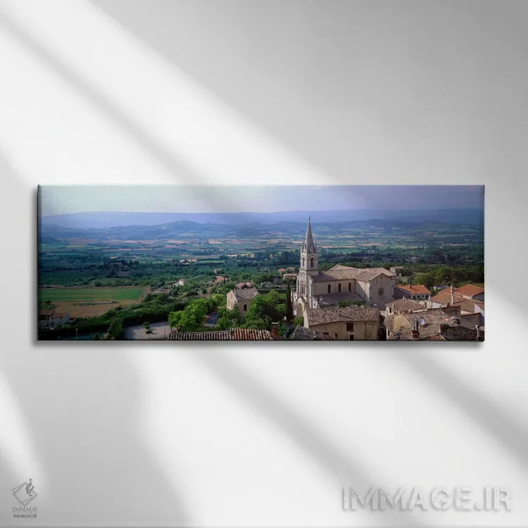 تابلو Bonnieux, Provence-Alpes-Cote d'Azur, France,نمای هوایی از کلیسا، بونییو، پروانس-آلپ-کوت دازور، فرانسه اثر پانورامیک ایمجز (استودیو عکاسی عریض) - نمای روبهرو روی دیوار