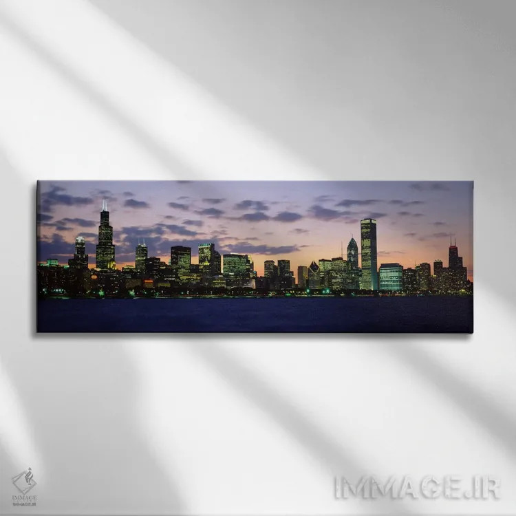 تابلو Illinois, USA,ساختمانهای یک شهر هنگام غروب، شیکاگو، ایلینوی، آمریکا اثر پانورامیک ایمجز (استودیو عکاسی عریض) - نمای روبهرو روی دیوار