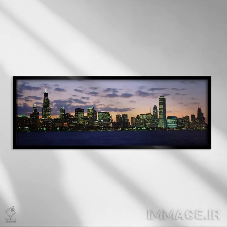 تابلو Illinois, USA,ساختمانهای یک شهر هنگام غروب، شیکاگو، ایلینوی، آمریکا اثر پانورامیک ایمجز (استودیو عکاسی عریض) - نمای قابدار مشکی