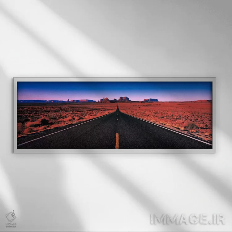 تابلو جاده پارک قبیلهای دره مانیومنت، یوتا، آمریکا اثر پانورامیک ایمجز (استودیو عکاسی عریض) - نمای قابدار سفید