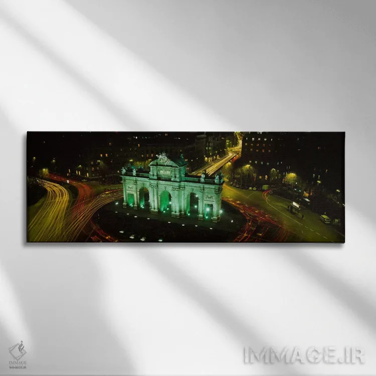 تابلو Plaza de la Independencia, Madrid, Spain,نمای زاویه بالا از پوئرتا د آلکالا، میدان استقلال، مادرید، اسپانیا اثر پانورامیک ایمجز (استودیو عکاسی عریض) - نمای روبهرو روی دیوار