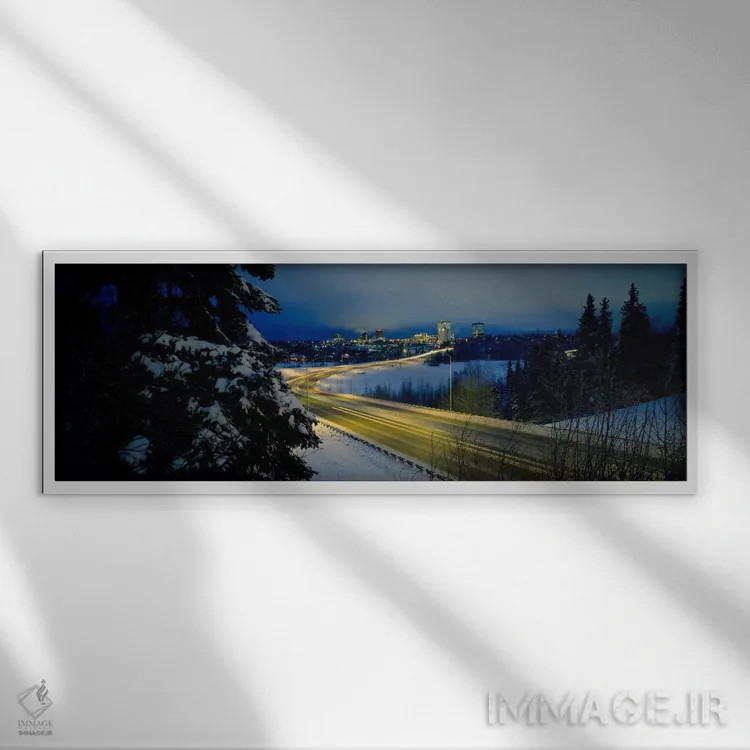 تابلو Anchorage, Alaska, USA,جاده پیچ در پیچ میان مناظر پوشیده از برف، انکوریج، آلاسکا، ایالات متحده آمریکا اثر پانورامیک ایمجز (استودیو عکاسی عریض) - نمای قابدار سفید