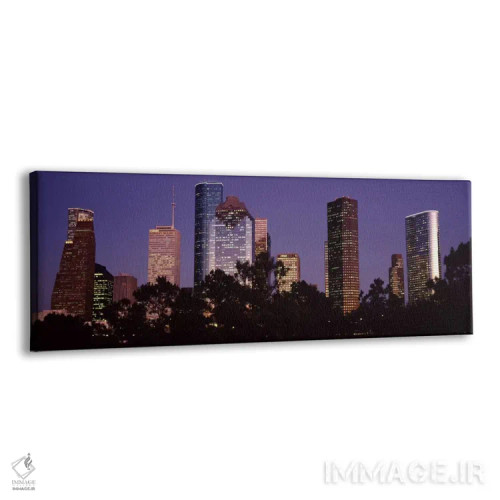 تابلو Harris county, Texas, USA,ساختمانهای روشنشده در شهر هنگام غروب، هیوستون، شهرستان هریس، تگزاس، آمریکا اثر پانورامیک ایمجز (استودیو عکاسی عریض) - نمای پرسپکتیو محصول
