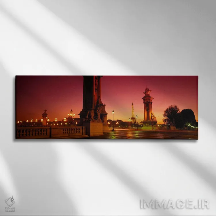 تابلو Paris, France,نمای دور از برج ایفل از میان پایههای پل الکساندر سوم، پاریس، فرانسه اثر پانورامیک ایمجز (استودیو عکاسی عریض) - نمای روبهرو روی دیوار