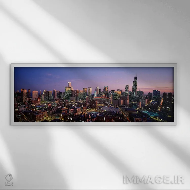 تابلو Chicago, Illinois, USA #2,آسمانخراشهای درخشان در غروب شهر، شیکاگو، ایلینوی، آمریکا (شماره ۲) اثر پانورامیک ایمجز (استودیو عکاسی عریض) - نمای قابدار سفید