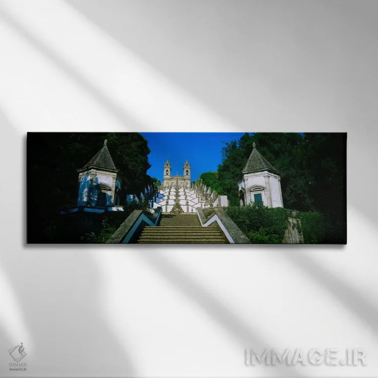 تابلو Bom Jesus Do Monte, Braga, Portugal,نمای پایین از کلیسا، پلههای پنج حس، بوم ژیزوس دو مونته، براگا، پرتغال اثر پانورامیک ایمجز (استودیو عکاسی عریض) - نمای روبهرو روی دیوار