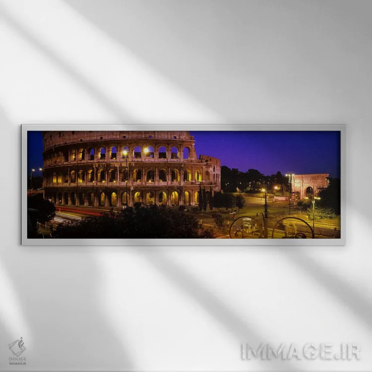 تابلو Rome, Lazio, Italy,کولوسئوم (آمفیتئاتر فلاویان) در شب، رم، لاتزیو، ایتالیا اثر پانورامیک ایمجز (استودیو عکاسی عریض) - نمای قابدار سفید