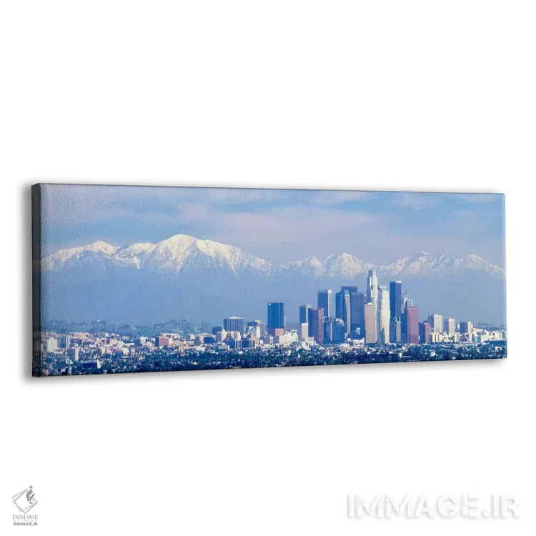 تابلو San Gabriel Mountains, City of Los Angeles, California, USA,ساختمانها در شهری با کوههای پوشیده از برف در پسزمینه، کوههای سن گابریل، لسآنجلس، کالیفرنیا، ایالات متحده آمریکا اثر پانورامیک ایمجز (استودیو عکاسی عریض) - نمای پرسپکتیو محصول