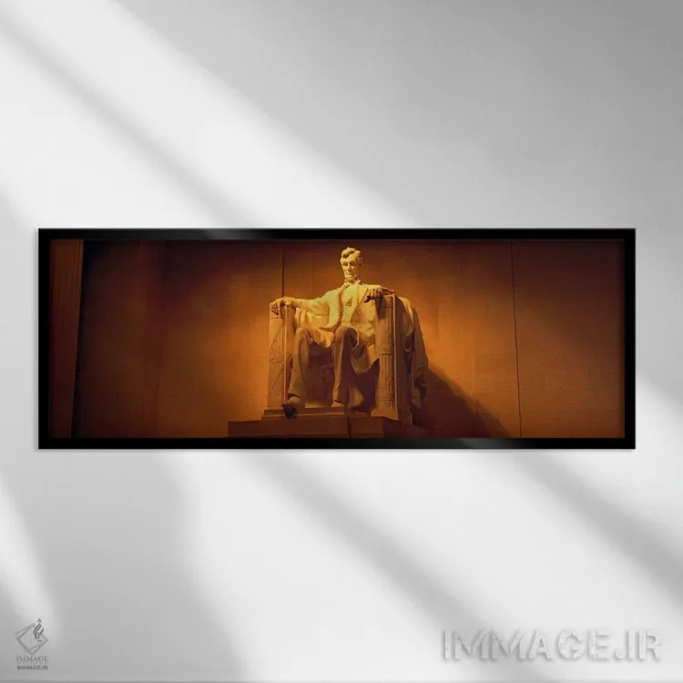 تابلو Washington DC, Lincoln Memorial, Low angle view of the statue of Abraham Lincoln,آمریکا، واشینگتن دیسی، یادبود لینکلن، نمای زاویه پایین از تندیس آبراهام لینکلن اثر پانورامیک ایمجز (استودیو عکاسی عریض) - نمای قابدار مشکی