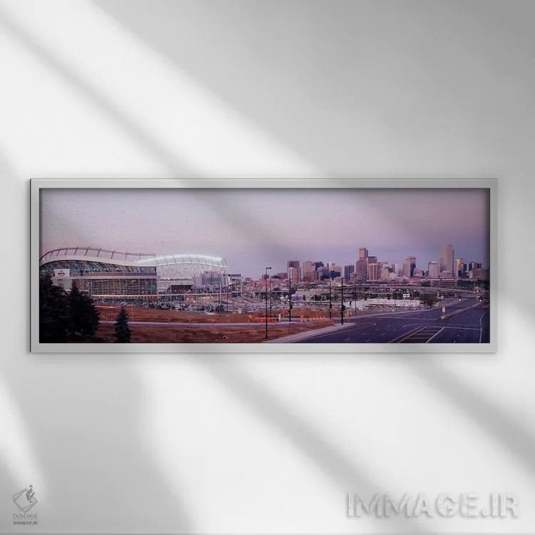تابلو Colorado, Denver, Invesco Stadium, Skyline at dusk,آمریکا، کلرادو، دنور، ورزشگاه اینوسکو، چشمانداز آسمان در غروب اثر پانورامیک ایمجز (استودیو عکاسی عریض) - نمای قابدار سفید