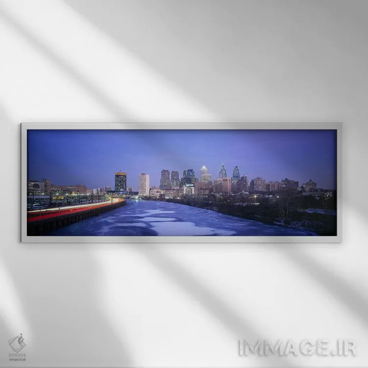 تابلو Philadelphia, Pennsylvania, USA,ساختمانهای روشنشده در شب، فیلادلفیا، پنسیلوانیا، آمریکا اثر پانورامیک ایمجز (استودیو عکاسی عریض) - نمای قابدار سفید