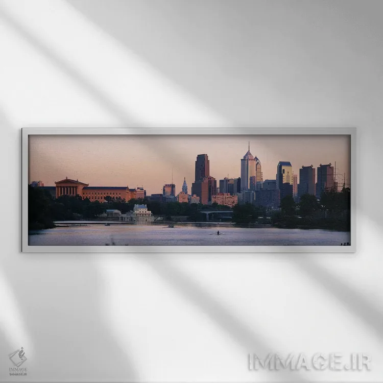 تابلو Philadelphia, Pennsylvania, USA,ساختمانها در کنار آب، فیلادلفیا، پنسیلوانیا، آمریکا اثر پانورامیک ایمجز (استودیو عکاسی عریض) - نمای قابدار سفید