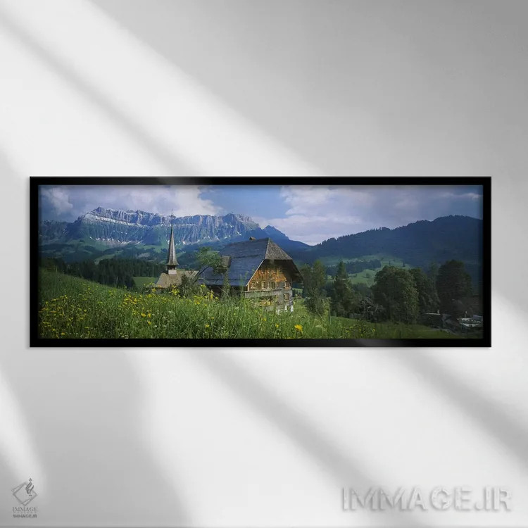 تابلو Emmental, Switzerland,کلبه و کلیسا در چشمانداز، اِمنتال، سوییس اثر پانورامیک ایمجز (استودیو عکاسی عریض) - نمای قابدار مشکی