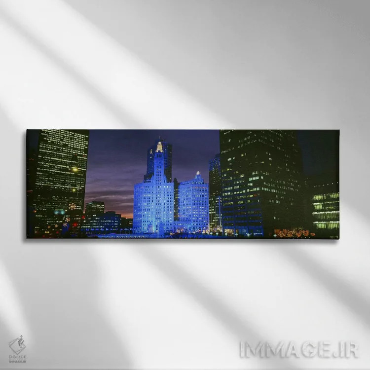 تابلو Blue Lights, Chicago, Illinois, USA,ساختمان ریگلی، نورهای آبی، شیکاگو، ایلینوی، آمریکا اثر پانورامیک ایمجز (استودیو عکاسی عریض) - نمای روبهرو روی دیوار