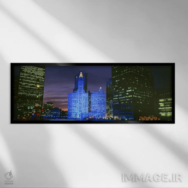 تابلو Blue Lights, Chicago, Illinois, USA,ساختمان ریگلی، نورهای آبی، شیکاگو، ایلینوی، آمریکا اثر پانورامیک ایمجز (استودیو عکاسی عریض) - نمای قابدار مشکی