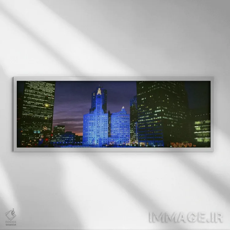 تابلو Blue Lights, Chicago, Illinois, USA,ساختمان ریگلی، نورهای آبی، شیکاگو، ایلینوی، آمریکا اثر پانورامیک ایمجز (استودیو عکاسی عریض) - نمای قابدار سفید