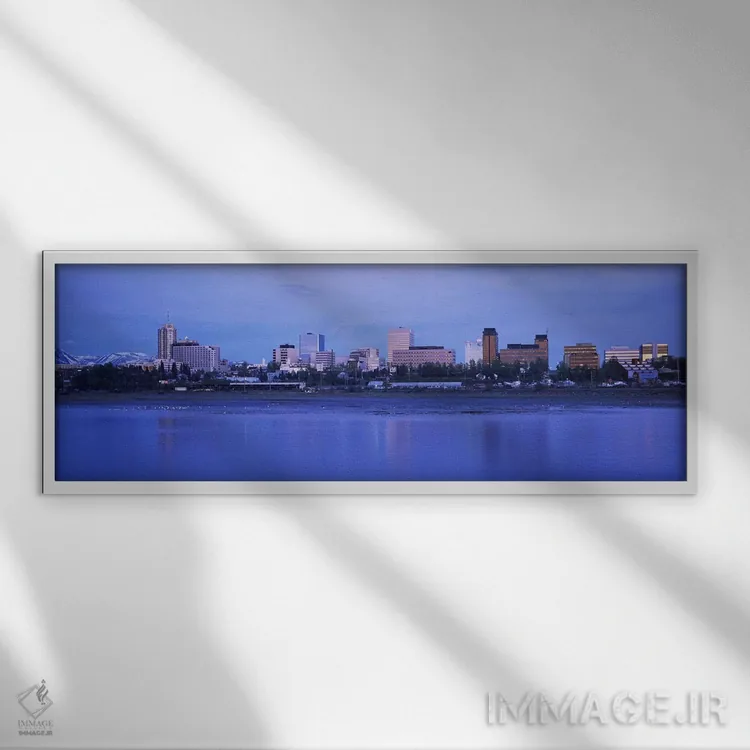 تابلو Anchorage, Alaska, USA,ساختمانها در کنار آب، انکوریج، آلاسکا، آمریکا اثر پانورامیک ایمجز (استودیو عکاسی عریض) - نمای قابدار سفید