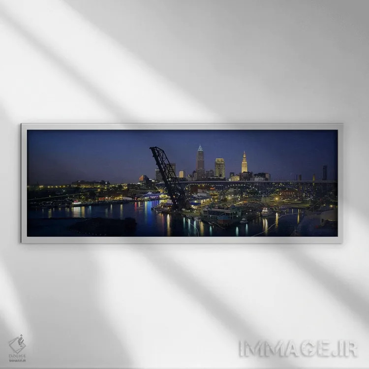 تابلو Ohio, USA,آسمانخراشهای روشنشده در شب در یک شهر، کلیولند، اوهایو، آمریکا اثر پانورامیک ایمجز (استودیو عکاسی عریض) - نمای قابدار سفید