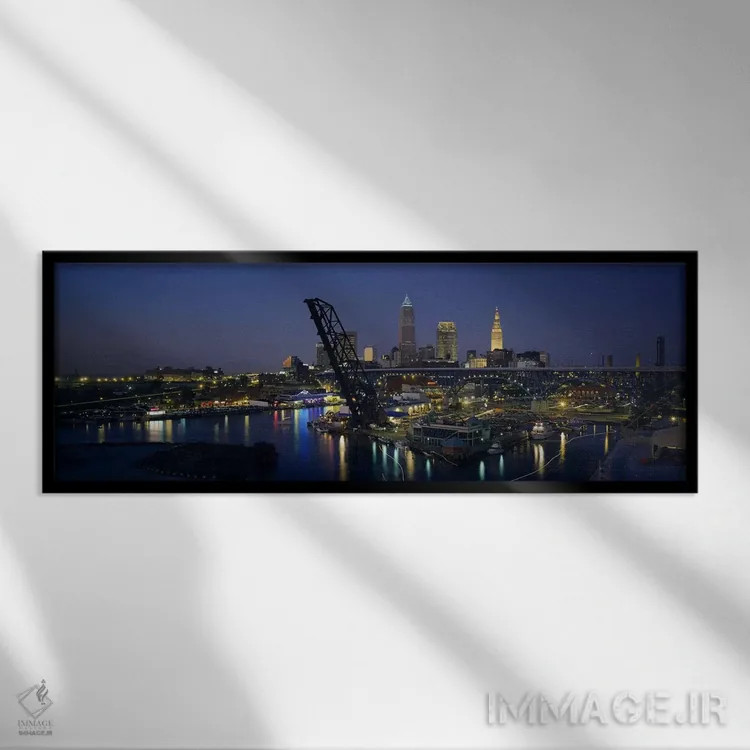 تابلو Ohio, USA,آسمانخراشهای روشنشده در شب در یک شهر، کلیولند، اوهایو، آمریکا اثر پانورامیک ایمجز (استودیو عکاسی عریض) - نمای قابدار مشکی