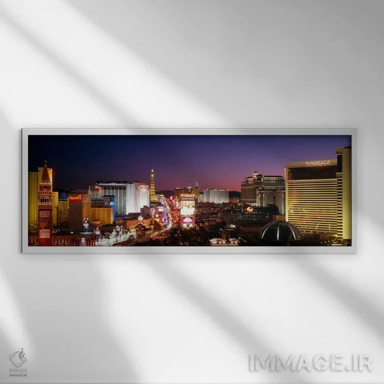 تابلو Las Vegas, Nevada, USA #2,ساختمانهای روشنشده در شب، لاس وگاس، نوادا، آمریکا (۲) اثر پانورامیک ایمجز (استودیو عکاسی عریض) - نمای قابدار سفید