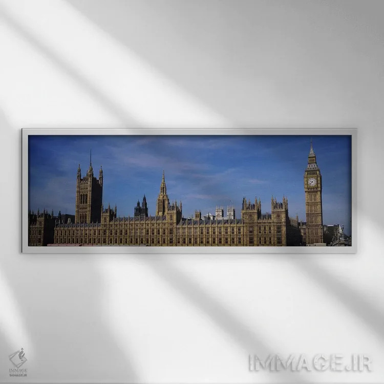 تابلو Big Ben and the Houses Of Parliament, London, England,آسمان آبی بالای ساختمانی، بیگ بن و پارلمان، لندن، انگلستان اثر پانورامیک ایمجز (استودیو عکاسی عریض) - نمای قابدار سفید