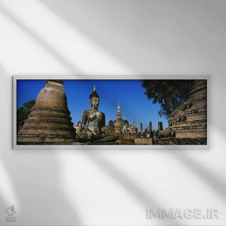 تابلو Wat Mahathat, Sukhothai, Thailand,مجسمه بودا در معبد، وات مهاتات، سوخوتای، تایلند اثر پانورامیک ایمجز (استودیو عکاسی عریض) - نمای قابدار سفید