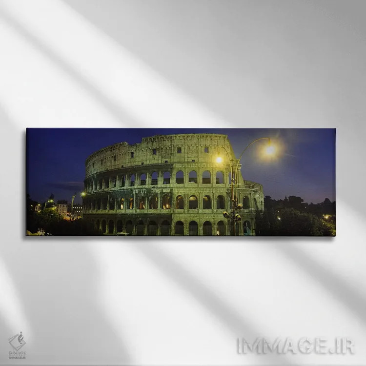 تابلو Coliseum, Rome, Italy,ساختمان باستانی روشن در شب، کولوسئوم، رم، ایتالیا اثر پانورامیک ایمجز (استودیو عکاسی عریض) - نمای روبهرو روی دیوار