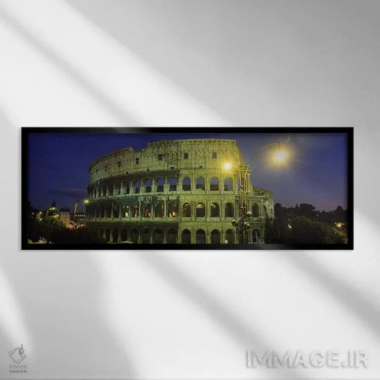 تابلو Coliseum, Rome, Italy,ساختمان باستانی روشن در شب، کولوسئوم، رم، ایتالیا اثر پانورامیک ایمجز (استودیو عکاسی عریض) - نمای قابدار مشکی