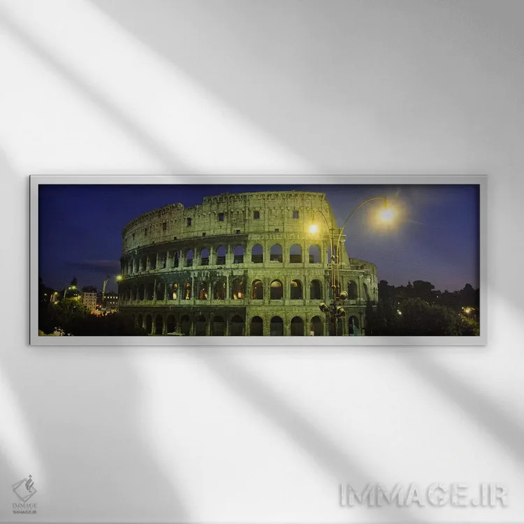 تابلو Coliseum, Rome, Italy,ساختمان باستانی روشن در شب، کولوسئوم، رم، ایتالیا اثر پانورامیک ایمجز (استودیو عکاسی عریض) - نمای قابدار سفید
