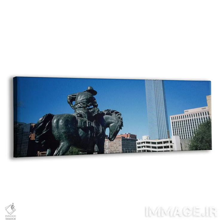تابلو Dallas, Texas, USA,نما از زاویه پایین از یک مجسمه در مقابل ساختمانها، دالاس، تگزاس، آمریکا اثر پانورامیک ایمجز (استودیو عکاسی عریض) - نمای پرسپکتیو محصول