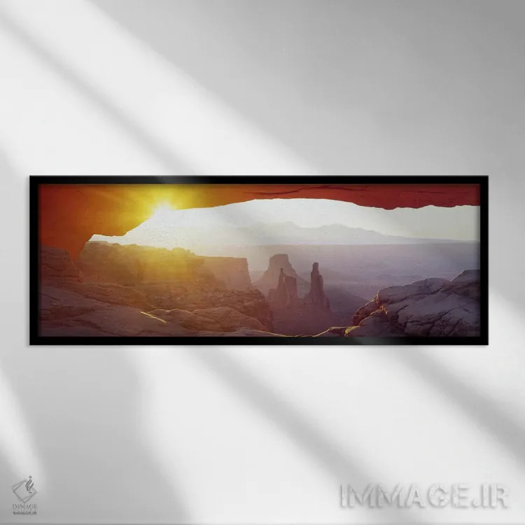 تابلو Canyonlands National Park, Utah, USA,منظر طلوع آفتاب از میان طاق مسا، پارک ملی کنیونلندز، یوتا، آمریکا اثر پانورامیک ایمجز (استودیو عکاسی عریض) - نمای قابدار مشکی