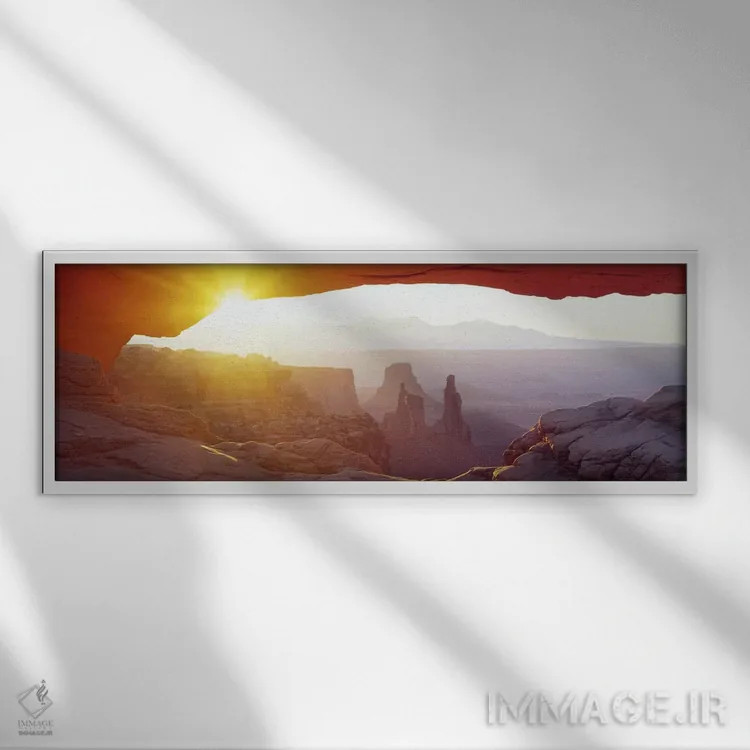تابلو Canyonlands National Park, Utah, USA,منظر طلوع آفتاب از میان طاق مسا، پارک ملی کنیونلندز، یوتا، آمریکا اثر پانورامیک ایمجز (استودیو عکاسی عریض) - نمای قابدار سفید