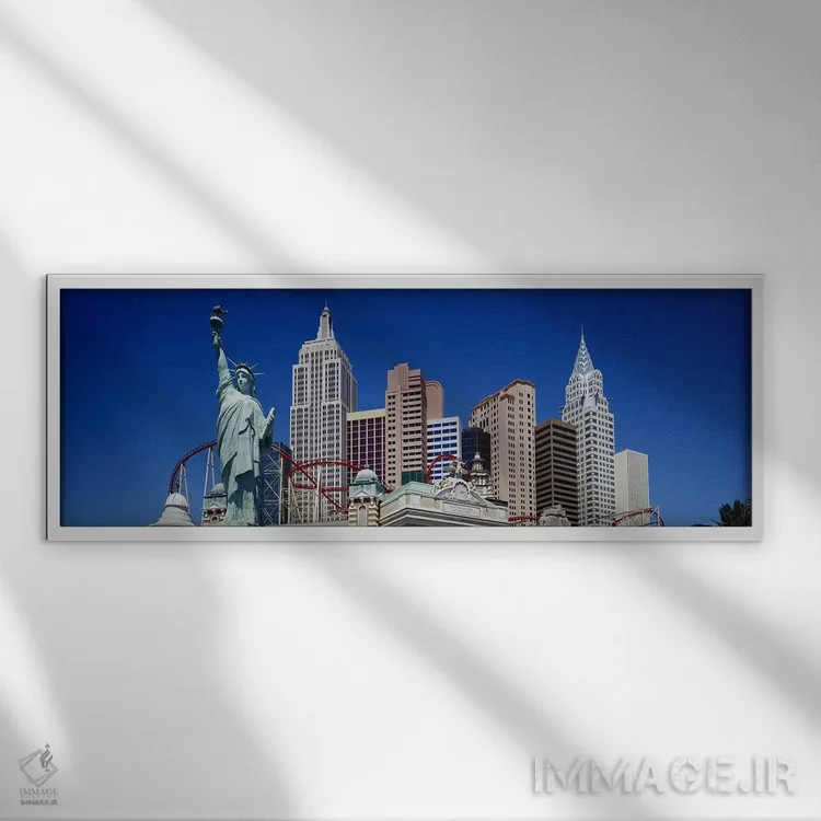 تابلو New York New York, Las Vegas, Nevada, USA,نمای زاویه پایین از آسمانخراشها، نیویورک نیویورک، لاس وگاس، نوادا، آمریکا اثر پانورامیک ایمجز (استودیو عکاسی عریض) - نمای قابدار سفید