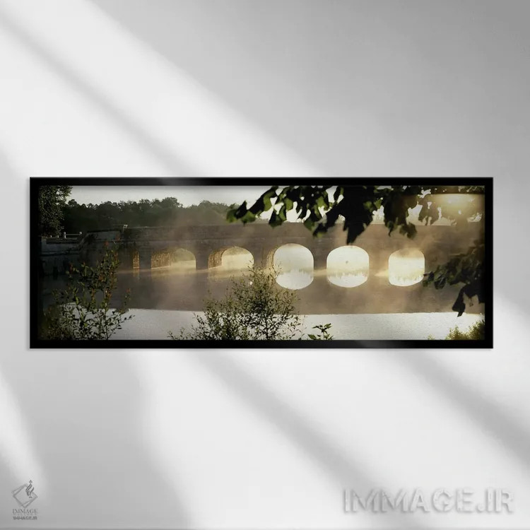 تابلو Loire Valley, France,مه صبحگاهی پیرامون پلی سنگی روی رود کُسون، دره لوآر، فرانسه اثر پانورامیک ایمجز (استودیو عکاسی عریض) - نمای قابدار مشکی