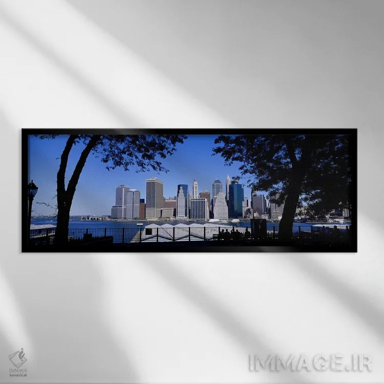 تابلو Manhattan, New York City, New York State, USA,آسمانخراشها کنار آب، منهتن، نیویورک، ایالت نیویورک، آمریکا اثر پانورامیک ایمجز (استودیو عکاسی عریض) - نمای قابدار مشکی