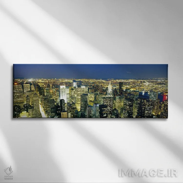 تابلو NYC, New York City, New York State, USA,نمای هوایی ساختمانهای روشن در غروب، منهتن، نیویورک، ایالات متحده اثر پانورامیک ایمجز (استودیو عکاسی عریض) - نمای روبهرو روی دیوار