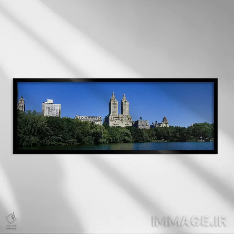 تابلو New York City, New York State, USA,ساختمانها در کناره یک دریاچه در منهتن، شهر نیویورک، ایالات متحده اثر پانورامیک ایمجز (استودیو عکاسی عریض) - نمای قابدار مشکی
